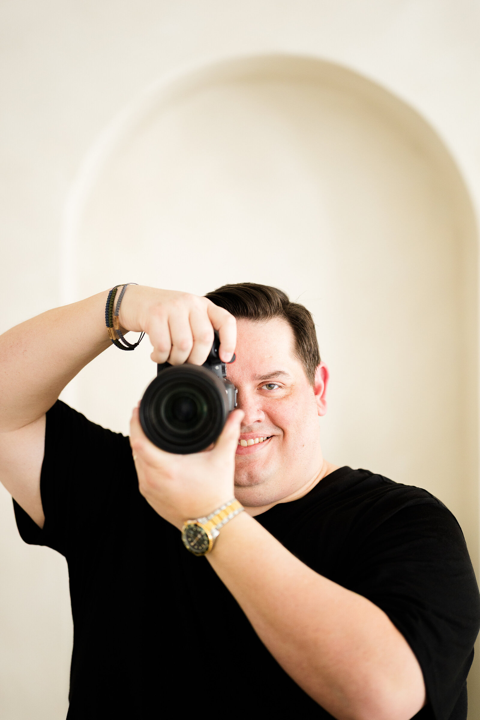 Alex Chapman filming handheld at a wedding